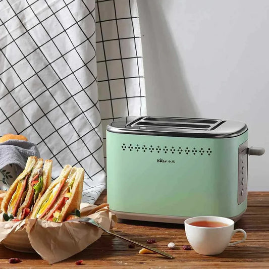 Morning mist green teddy bear toaster measuring 285mm wide with two bread slots and compact design
