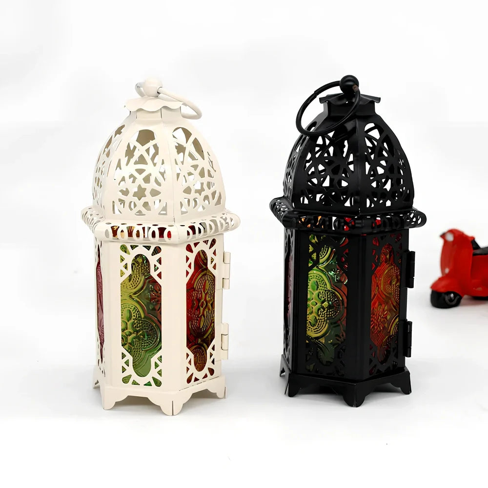 Wrought iron candle holder with 16cm height and 7cm diameter in black finish showing hanging design