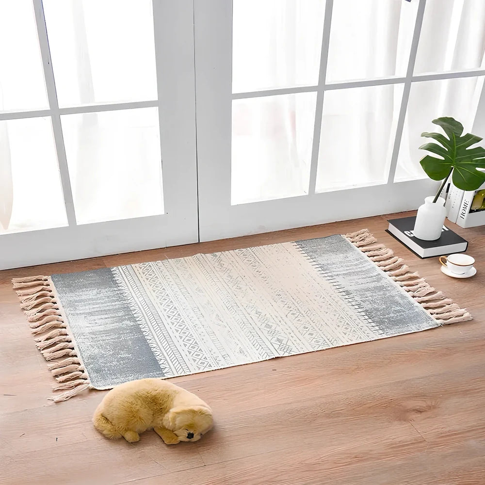 Hand-woven Scandinavian style linen cotton rug with woven tassels in plant-dyed colours measuring 60x90cm