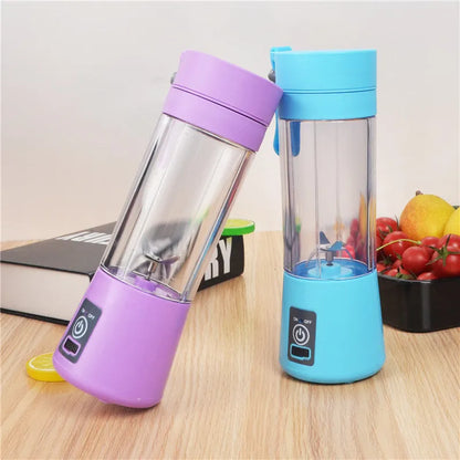 Pink portable USB electric fruit juicer blender cup with stainless steel blade and carry handle.