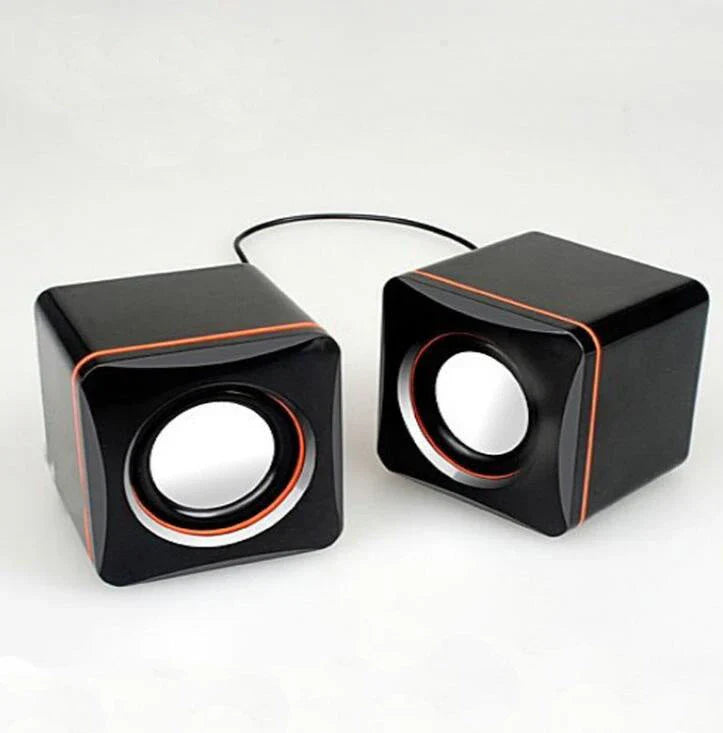 Compact USB-powered desktop speaker with adjustable volume and clear sound quality