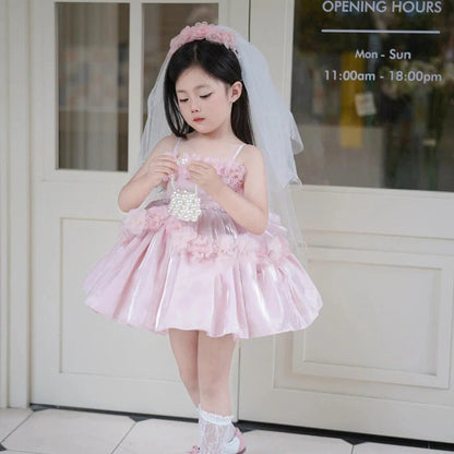Pink polyester flower girl wedding pettiskirt with princess design, shown on mannequin