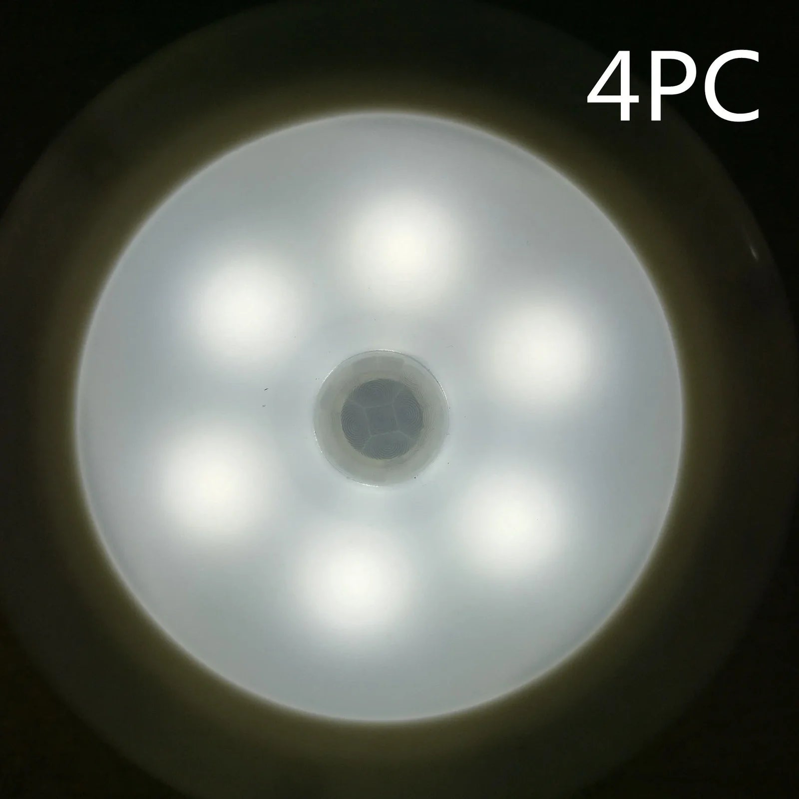 White motion-sensing LED cabinet lamp with magnetic back for wireless installation