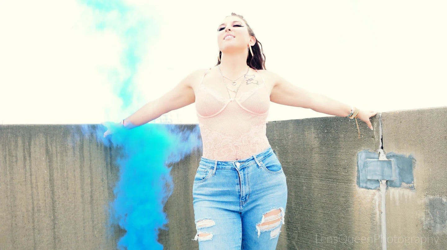 Vibrant colored smoke bombs creating a dramatic, captivating atmosphere for photography, events, and live performances.