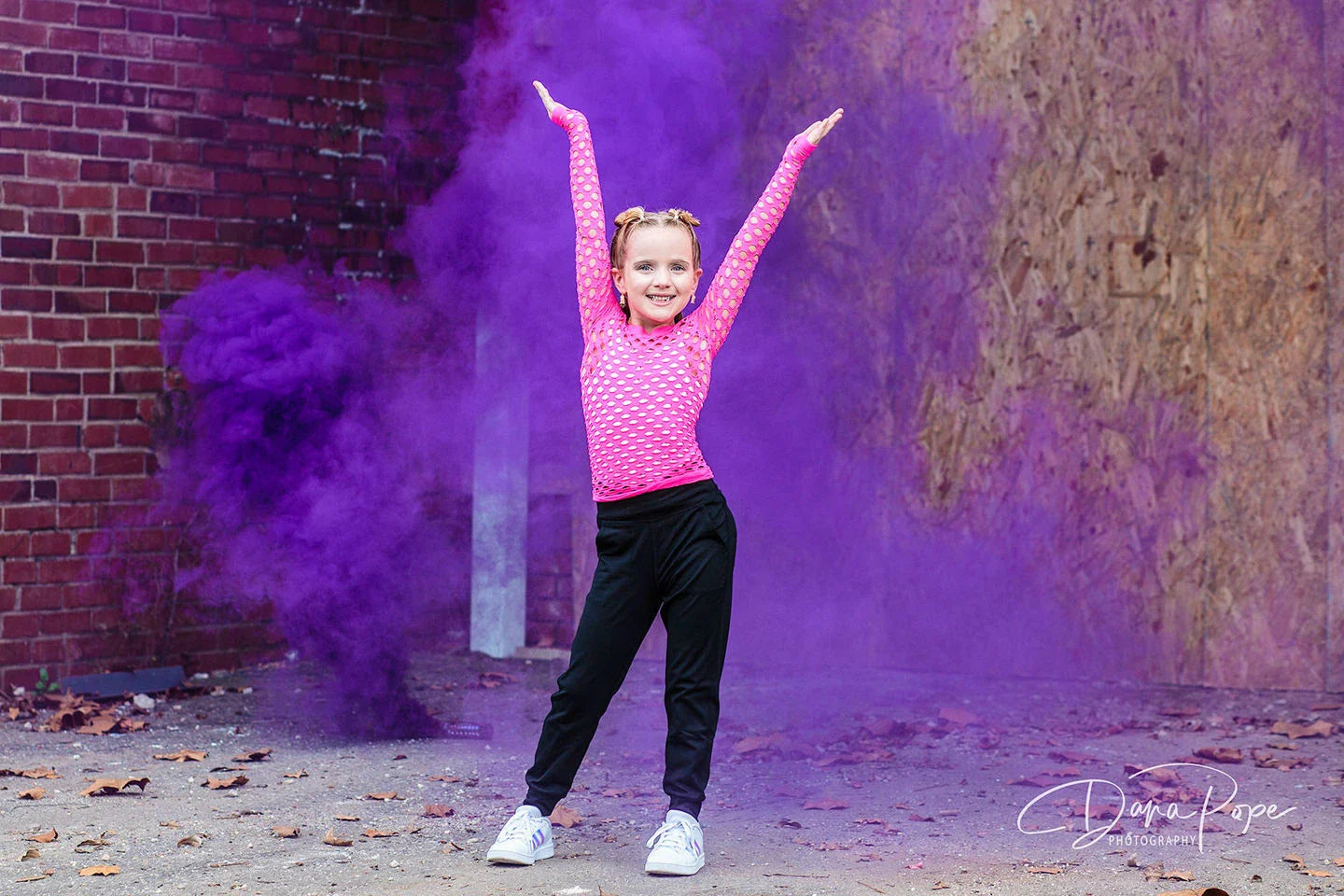Vibrant colored smoke bombs creating a dramatic, captivating atmosphere for photography, events, and live performances.