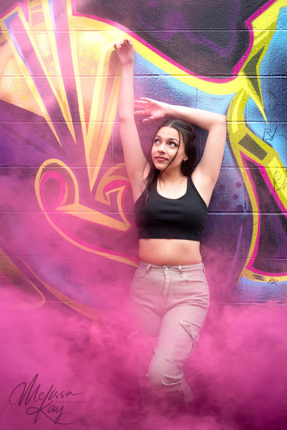 Vibrant colored smoke bombs creating a dramatic, captivating atmosphere for photography, events, and live performances.