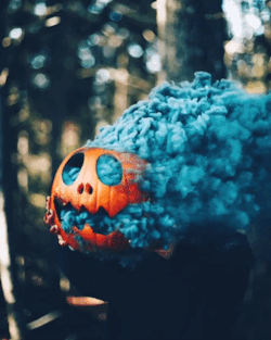 Vibrant colored smoke bombs creating a dramatic, captivating atmosphere for photography, events, and live performances.