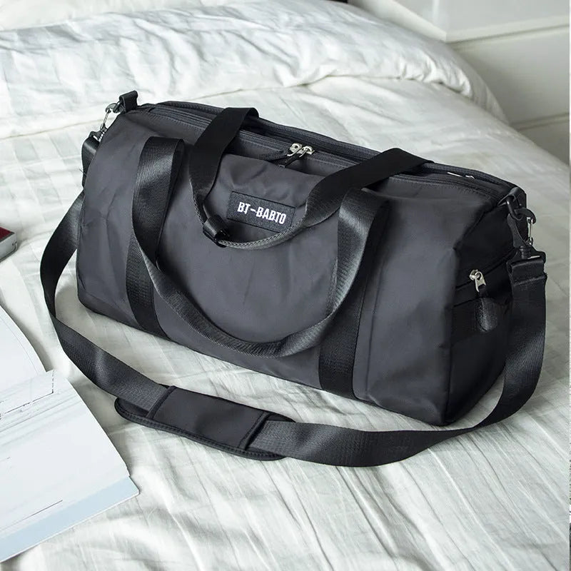 Beige casual sports bag with contrasting letter pattern and under 20L capacity