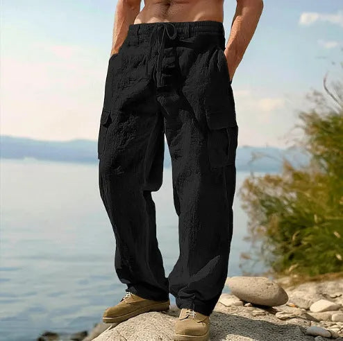 Men's thin cotton wide-leg casual trousers in light army green colour, showing loose fit and mid-waist design