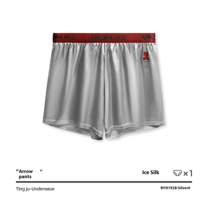 Solid colour men's polyester boxer briefs on a mid-waist, shown in black, red, blue, silver, purple, and brown.