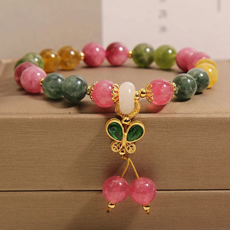 Women's tourmaline butterfly pendant bracelet with colourful stone details and rhinestone elements