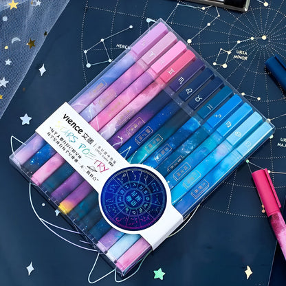 Twelve constellation ballpoint pens in a 12-piece plastic zodiac pen set with bright star designs.