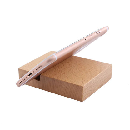 Beech wood mobile phone holder with coin slot showing adjustable angle and resin decorative elements