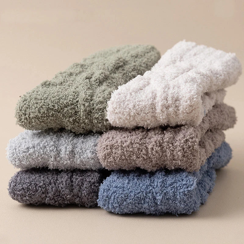 Cozy coral fleece socks in various colors, designed for superior comfort and warmth