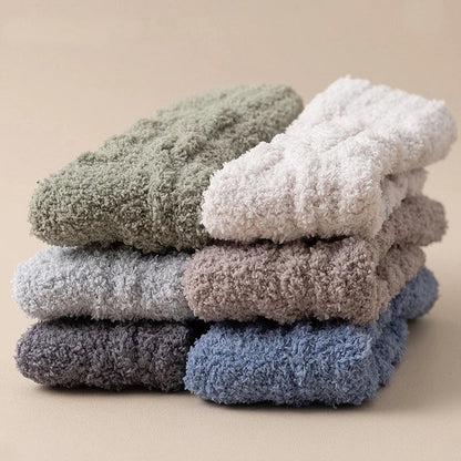 Cozy coral fleece socks in various colors, designed for superior comfort and warmth