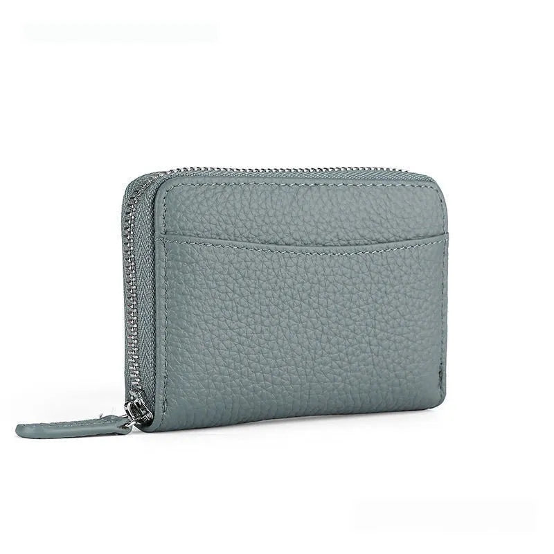 Genuine leather men's and women's zipper coin storage purse in black with sewing line detail.