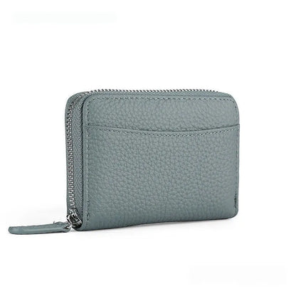 Genuine leather men's and women's zipper coin storage purse in black with sewing line detail.