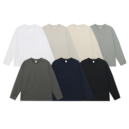 Man wearing a simple solid colour long sleeve cotton t-shirt in a loose, casual fit.