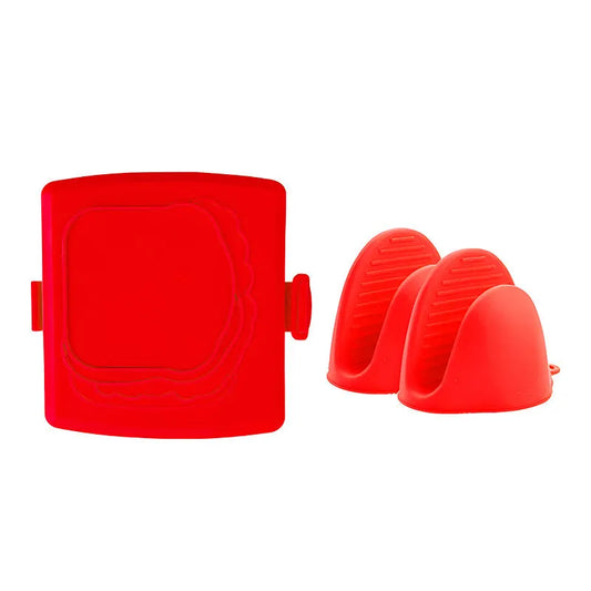 Red silicone baking tray with handbag-shaped mould and matching heat-resistant gloves on kitchen counter