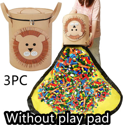 Green felt storage cube with pull rope unfolded into a large square play mat on a wooden floor.
