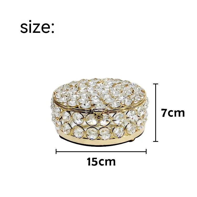 French gold iron jewellery box with crystal glass panels showing jewellery inside