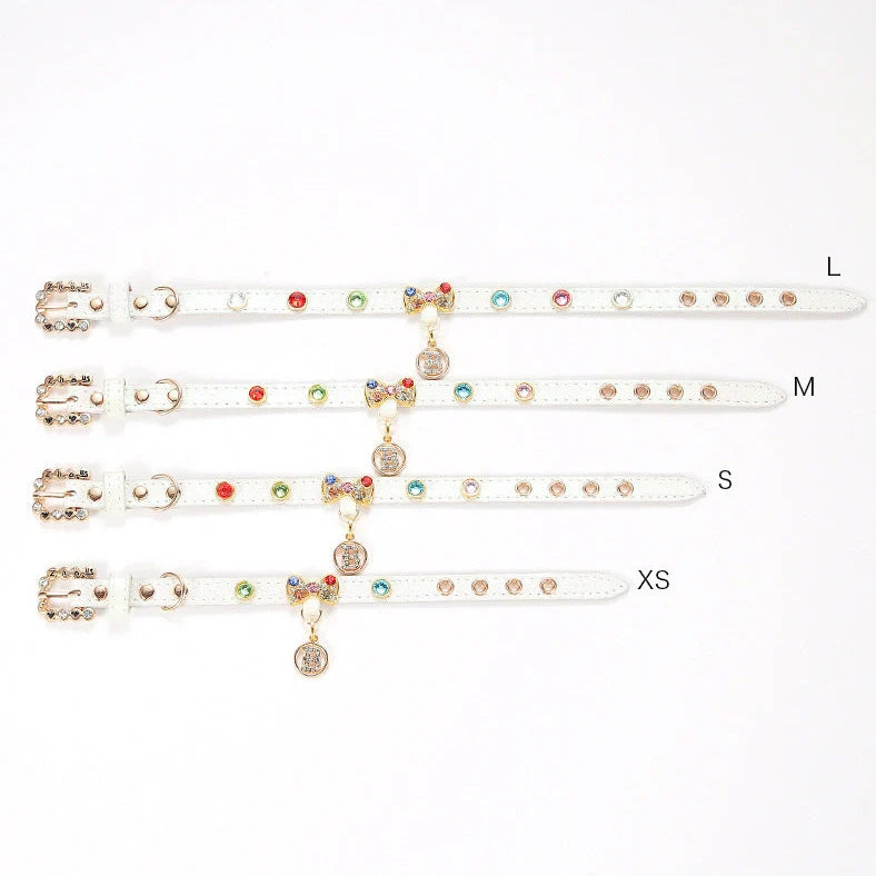 White cat collar with silver diamond alloy bow showing four size options from 26cm to 38cm length