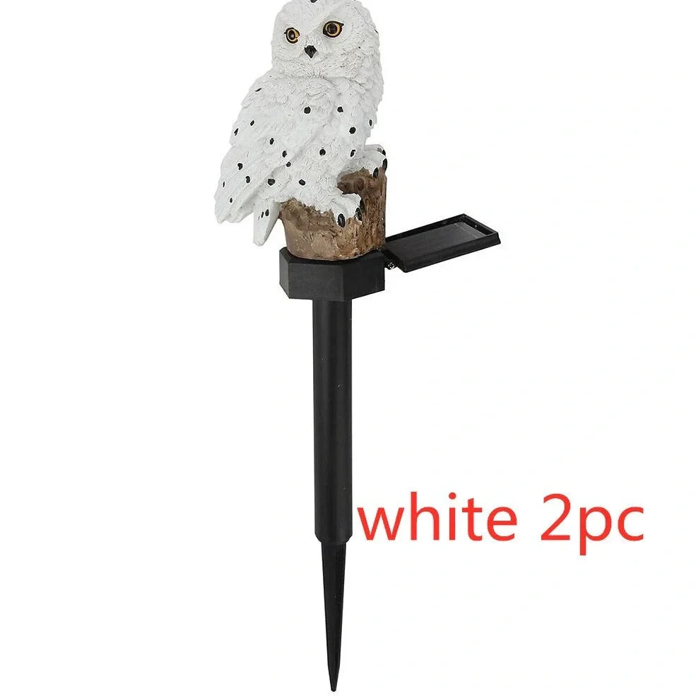 Solar owl garden light with realistic design standing 45cm tall, featuring LED illumination and solar panel