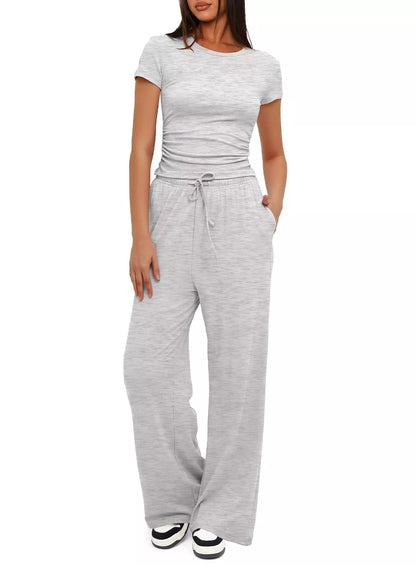 Women's 2-piece solid color yoga set with short-sleeve top and high-waisted pants