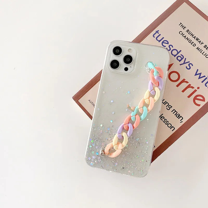 Silicone soft cover phone case with bracelet starry design in transparent, black, pink, or green for iPhone 14 and 15