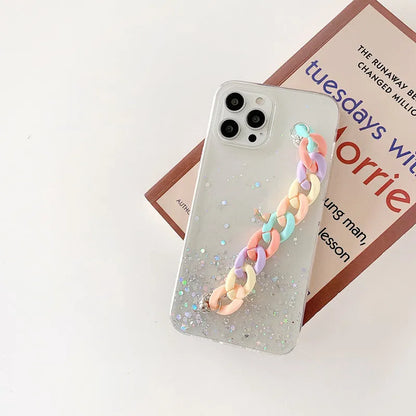 Silicone soft cover phone case with bracelet starry design in transparent, black, pink, or green for iPhone 14 and 15