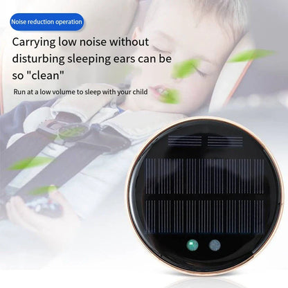 Black solar-powered car humidifier mounted on air conditioning vent with water mist visible