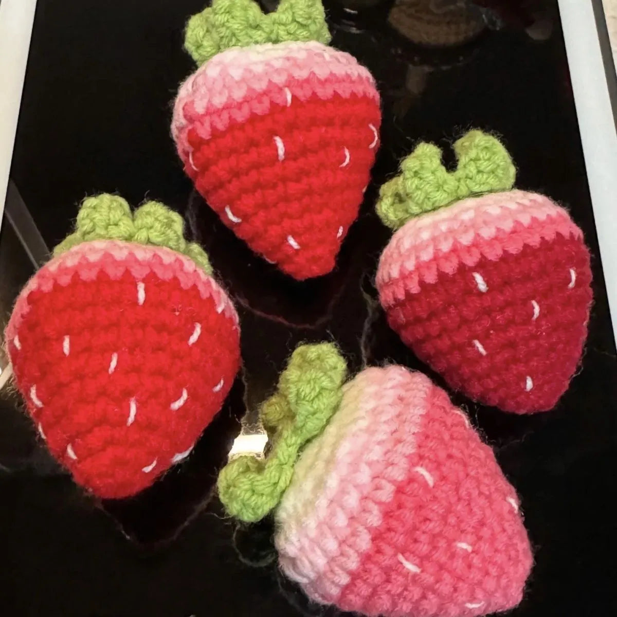 Red and pink plush strawberry pendant keychains with soft texture