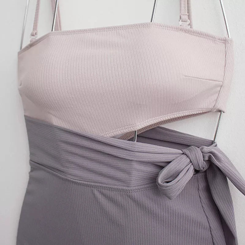 One-piece swimsuit in solid color with chest pad, sizes M, L, XL