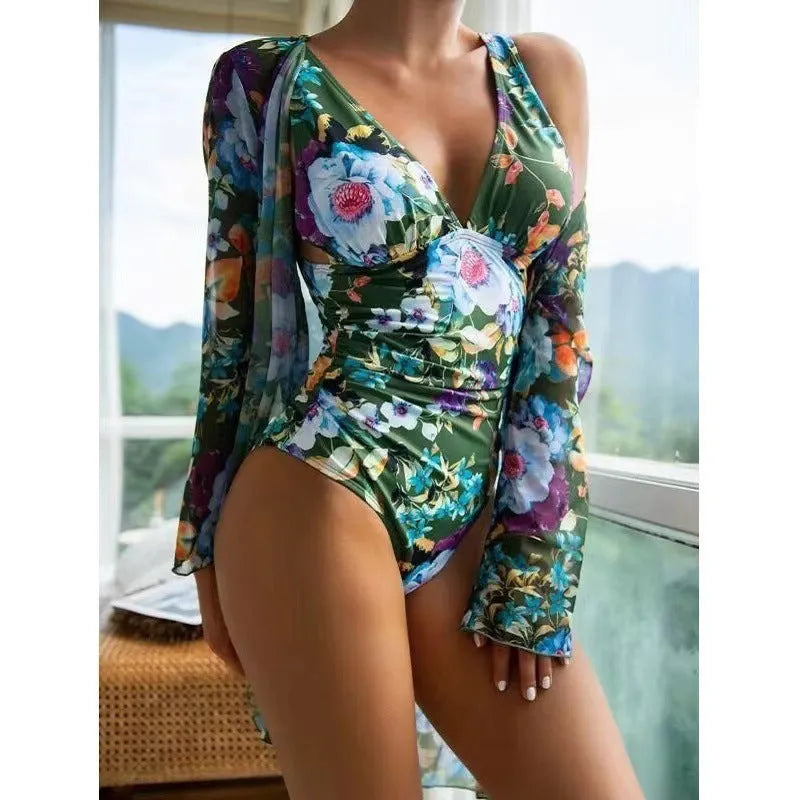 Women's floral print bikini three-piece swimsuit set with matching coat in a selection of colours.