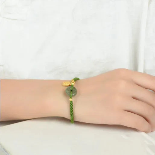 Women's corn knot Hetian jade safety buckle bracelet with hand-woven flexible wire and green rope design