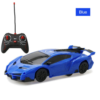Red remote-controlled car climbing wall with industrial fan system and wireless controller