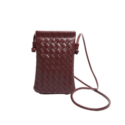 Vertical square vintage weave crossbody bag in multiple colours showing internal dark cell phone pocket.