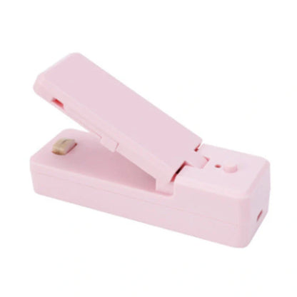 Portable ABS mini snack packaging bag heat sealing machine in white, grey, pink, and black