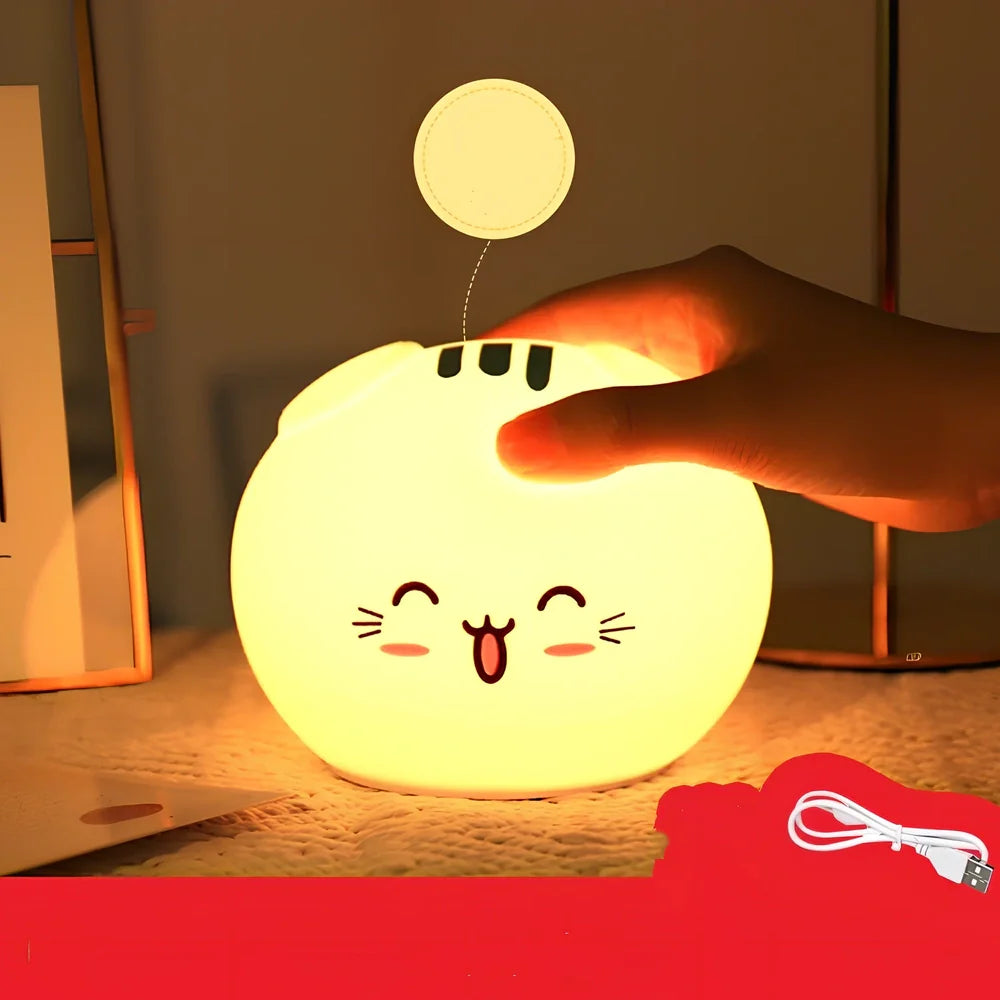 Silicone night light with fold-eared cat design showing LED illumination and USB charging port