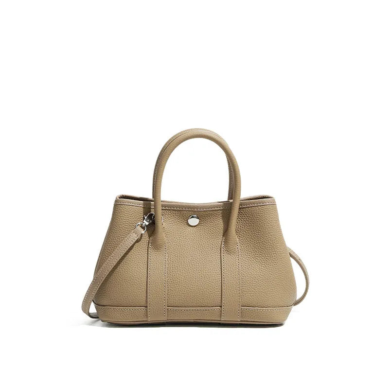 Genuine leather crossbody bag for women in first layer cowhide, horizontal square shape, single shoulder strap, shown in chicken yellow