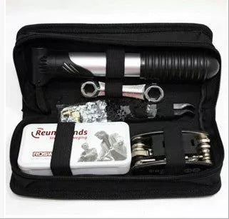 SNJUE Tool Kit with various tools including wrenches, screwdrivers, and tire repair items