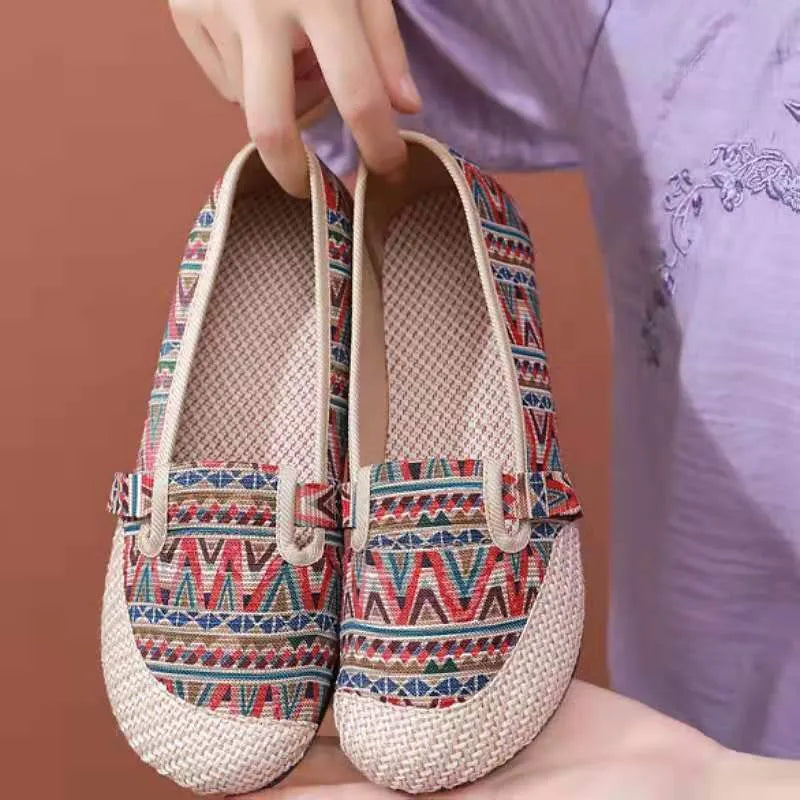 Women's ethnic style cloth shoes with shallow mouth design, colour stitching, and flat heel