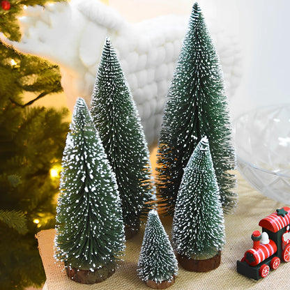 Mini Christmas tree with white snow flocking on green PVC branches, tabletop decoration
