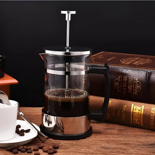 Compact manual pour over coffee maker with glass carafe and stainless steel filter, showing 350ml capacity.