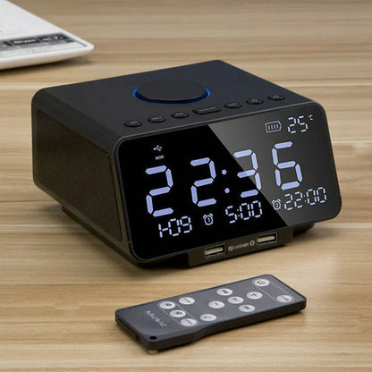 Black wireless alarm clock speaker with dual speakers, display, and control buttons