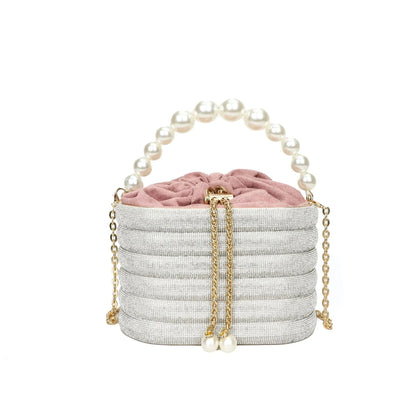 Women's soft PU crossbody bag with beaded accents, round shape, and single shoulder strap in black colour.