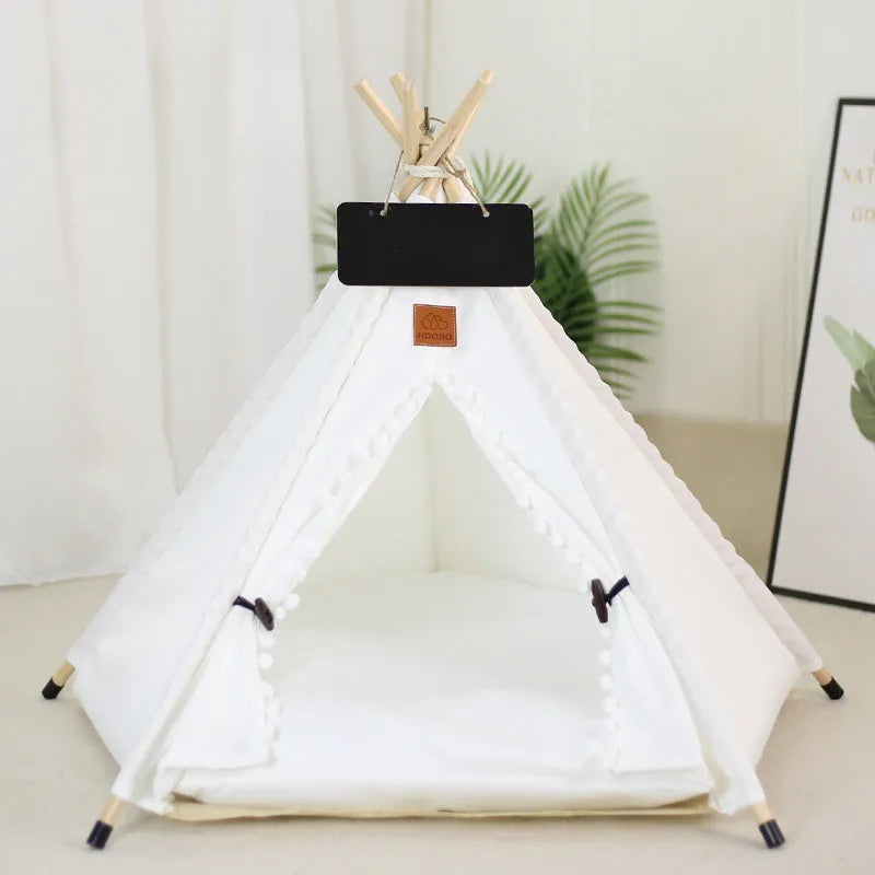 A striped pet teepee tent bed with a cushion inside, shown in a yellow colour option.