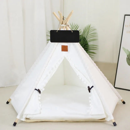 A striped pet teepee tent bed with a cushion inside, shown in a yellow colour option.