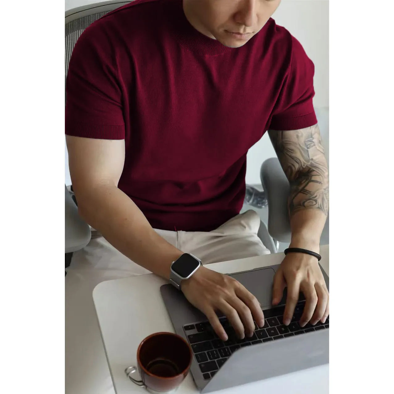 Men's slim-fit solid colour t-shirt in breathable polyester knitwear, shown in multiple colour options.