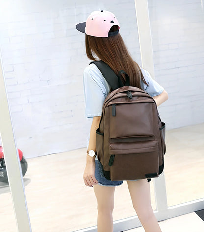 Black men's PU leather backpack with computer pocket and adjustable shoulder straps